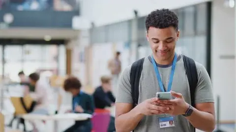 Student checking virtual tour on a mobile device